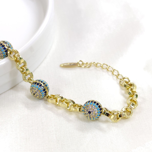 XUPING ÜÇLÜ SOSYETE GÖZÜ NAZAR BONCUKLU BİLEKLİK 17+3 CM - ALTIN SARI